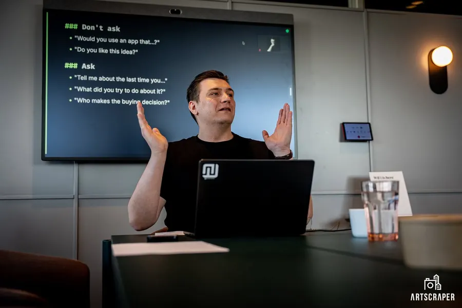 A workshop host explaining a point to the group